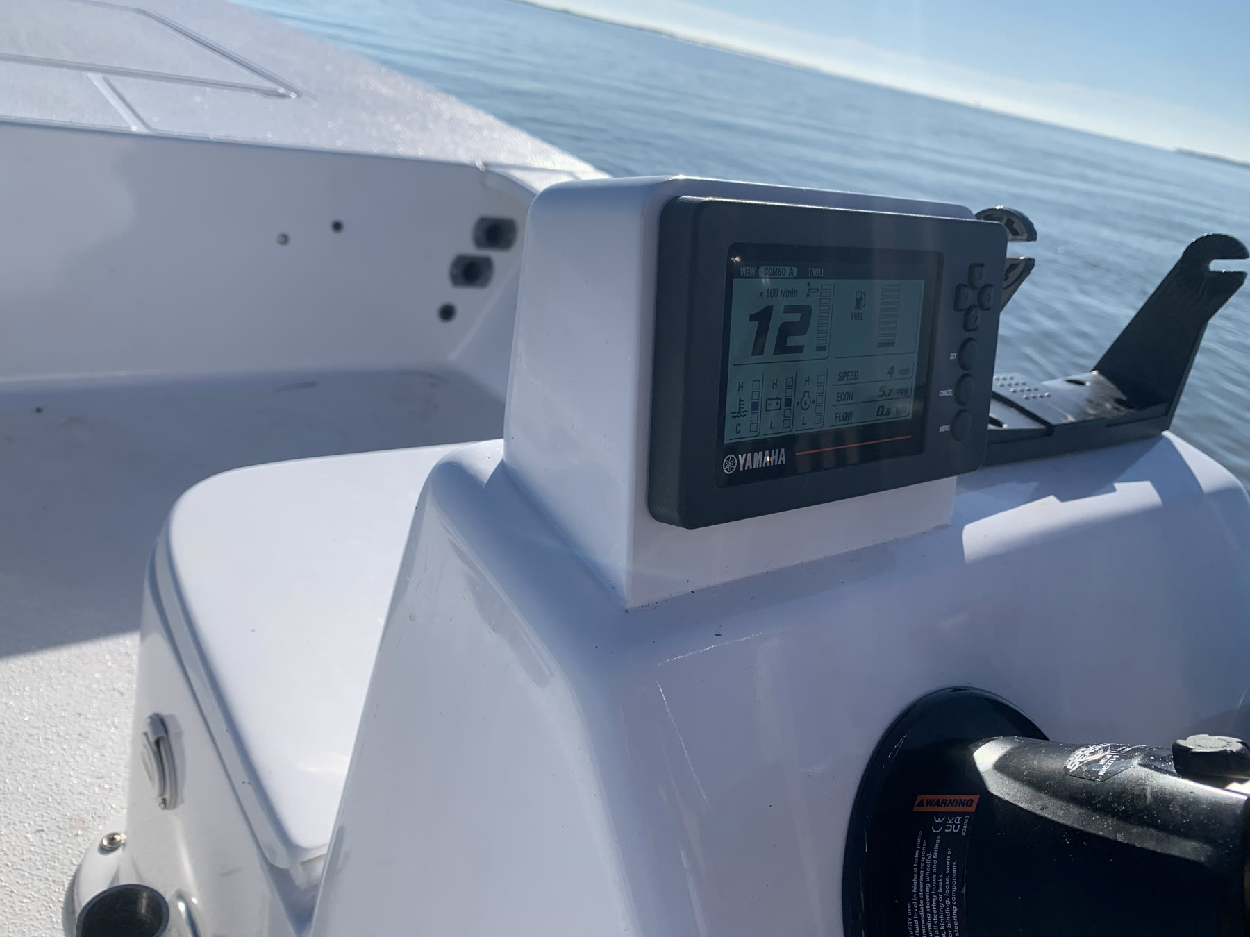 Yamaha display in a custom white helm pod